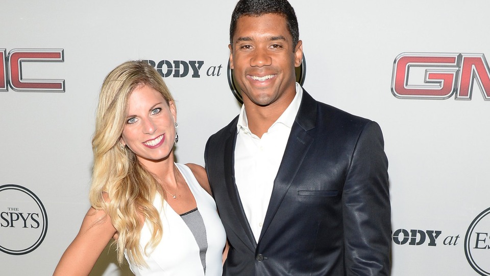 Ashton Meem and Russell Wilson attending a formal sports gala in 2013