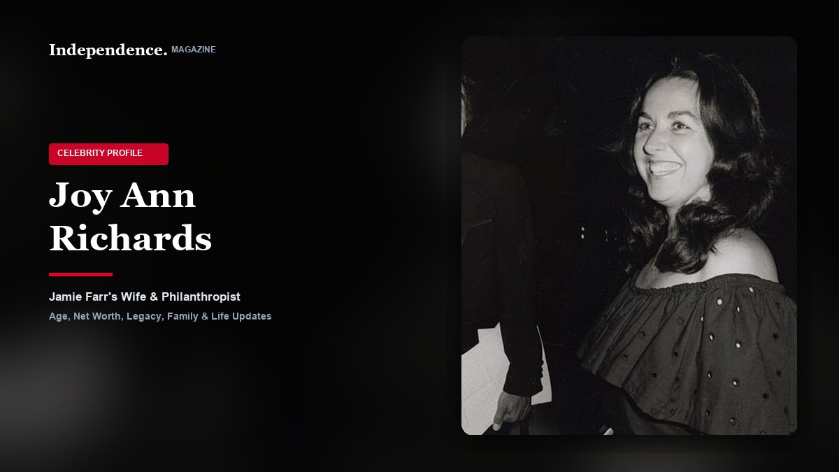 Joy Ann Richards smiling warmly during an evening premiere celebration in Los Angeles alongside Jamie Farr.