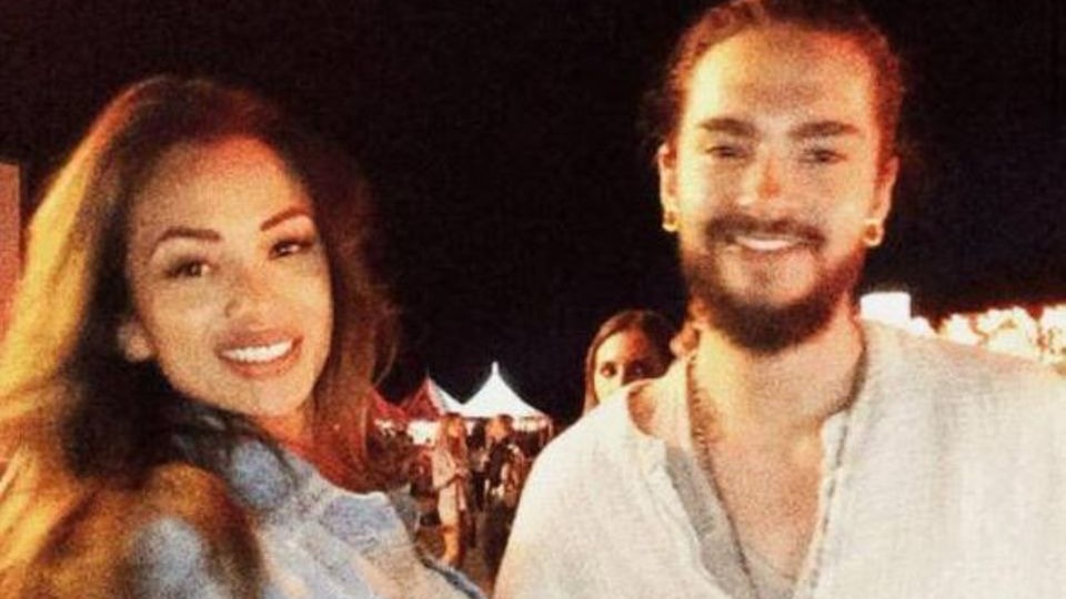 Ria Sommerfeld and musician Tom Kaulitz attending an evening music event