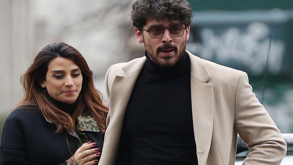 Michele Morrone and Rouba Saadeh walking together
