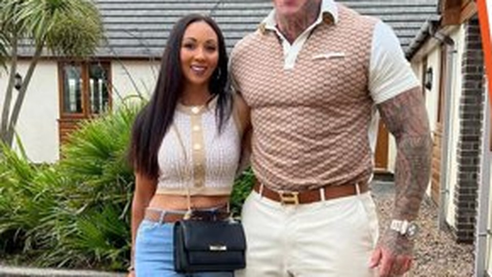 Sacha Stacey and Martyn Ford standing together during a relaxed family day